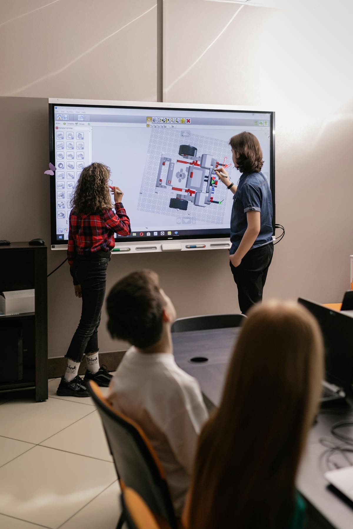Students collaborating in a modern active learning classroom